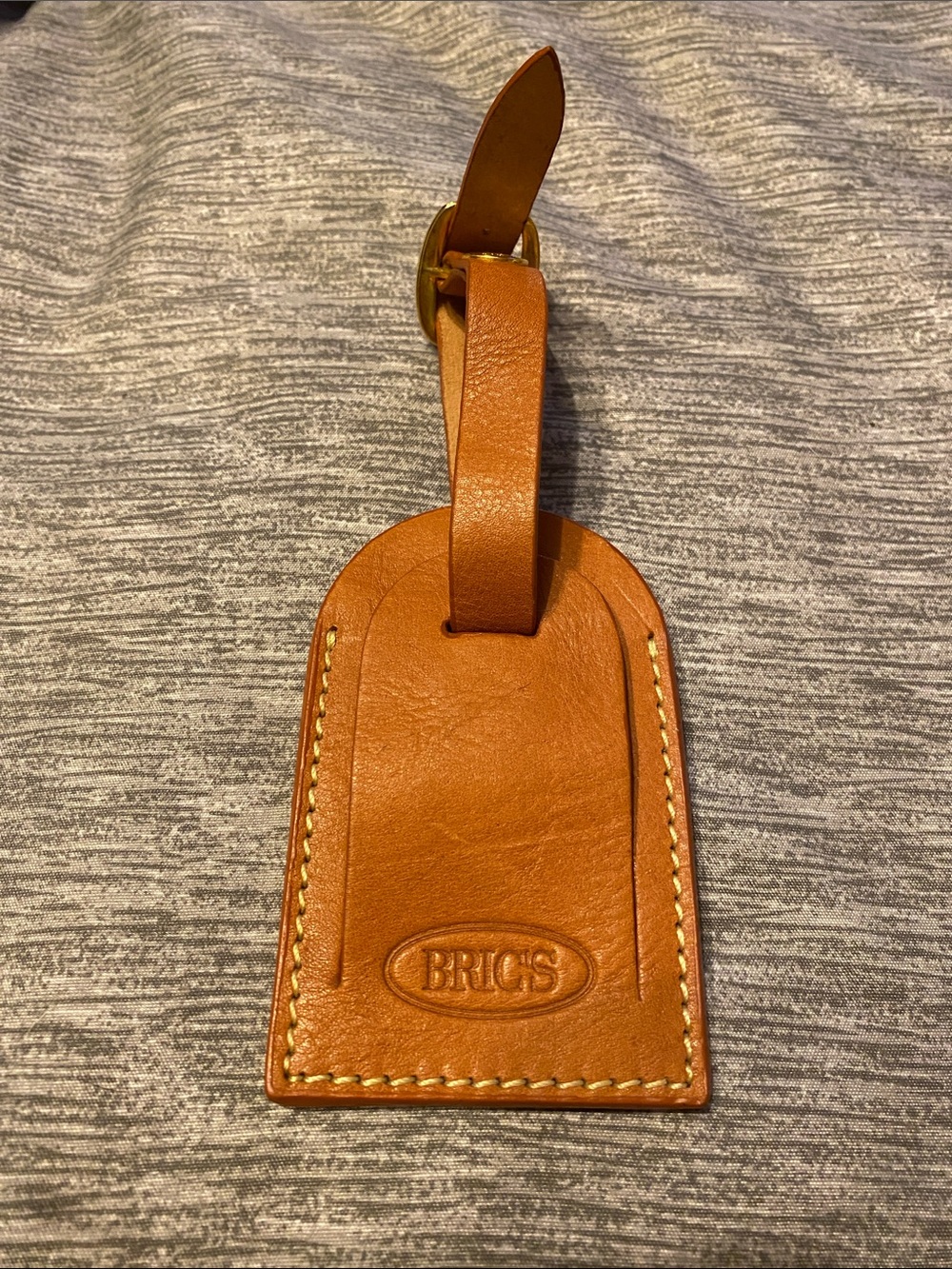 BRIC’s Luggage Tag Tan Camel Colored Leather w/ Gold Accents Excellent Condition